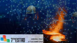 A worker in a steel plant looking at a steel slap.